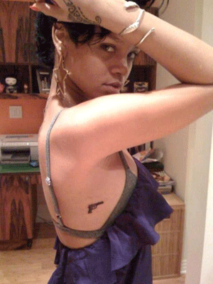 When I read that Fashion Bomb favorite Rihanna got a new gun tattoo, 
