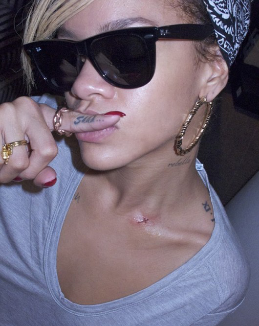 For her 16th tattoo Rihanna chose a small simple cross on her collarbone