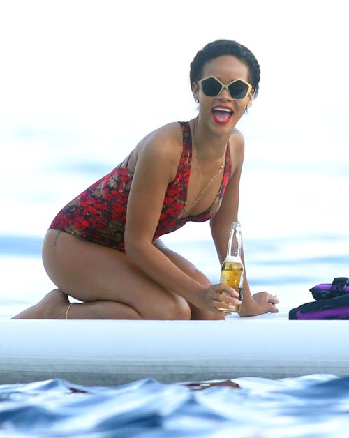 Rihanna' s French Yacht Minkpink Midnight Dreaming One Piece 
Floral Cross Back SwimSuit and Miu Miu Culte Oxagonal Sunglasses