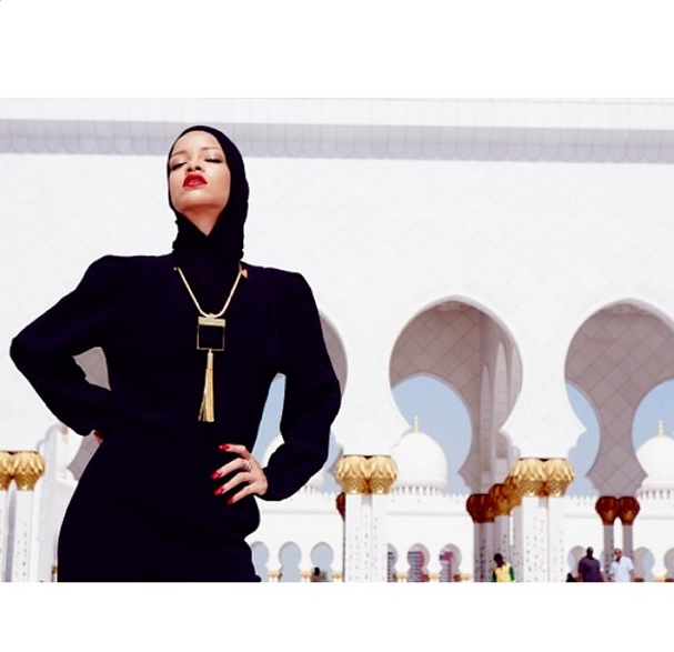 00 Rihanna's Abu Dhabi Stella McCartney Black Ofella Jumpsuit,  Saint Laurent Onyx Tassel Necklace, and Manolo Blahnik Hangisi Jeweled Pumps