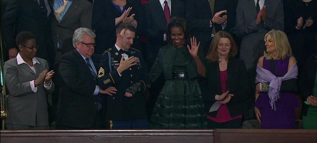 2  michelle obama state of the union address azzedine alaia  green dress and cardigan look ensemble