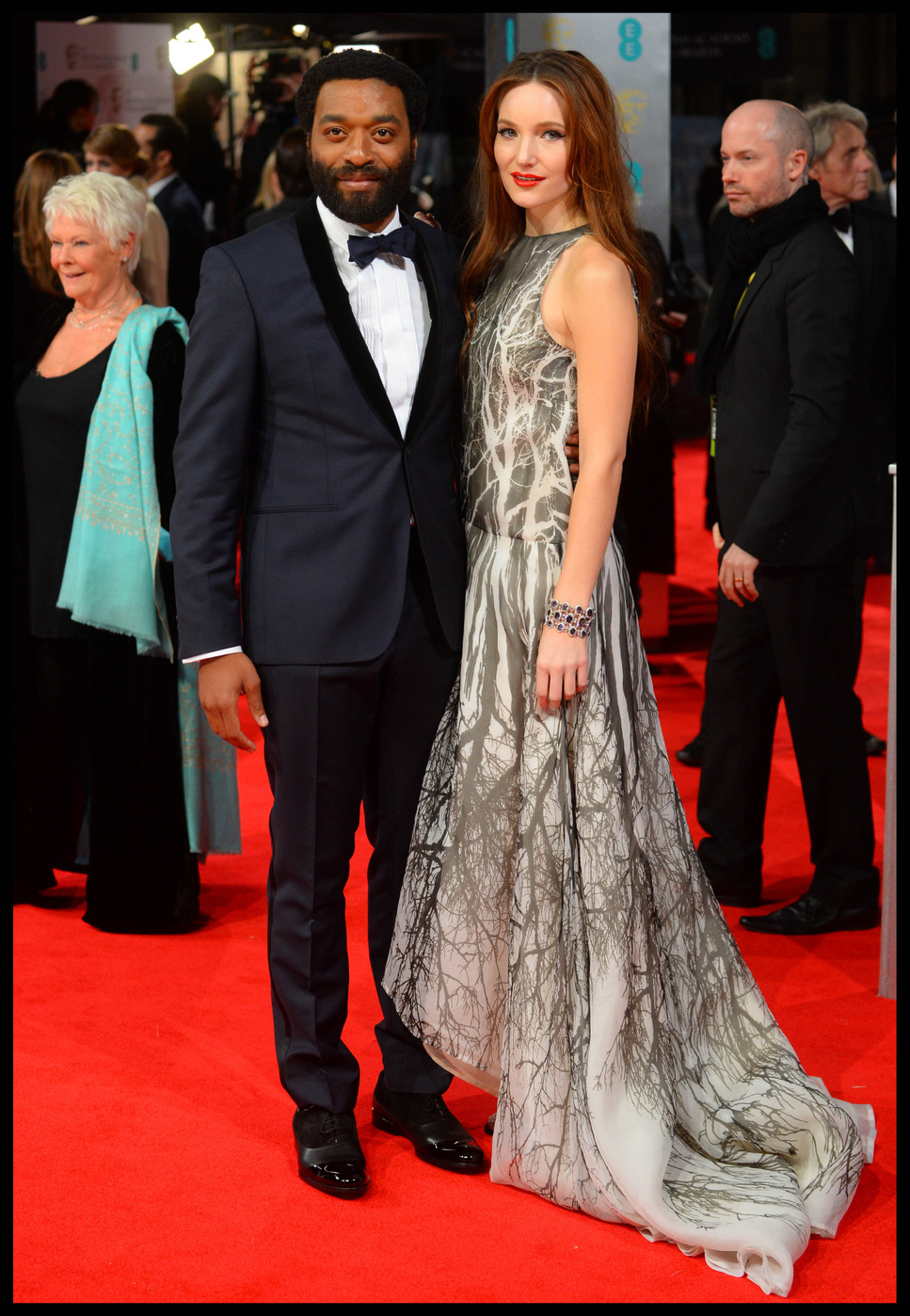 Chiwetel Ejiofor and Sari Mercer arrive for the EE British Academy Film Awards 2014 (BAFTA) at The Royal Opera House, Covent Garden in London
