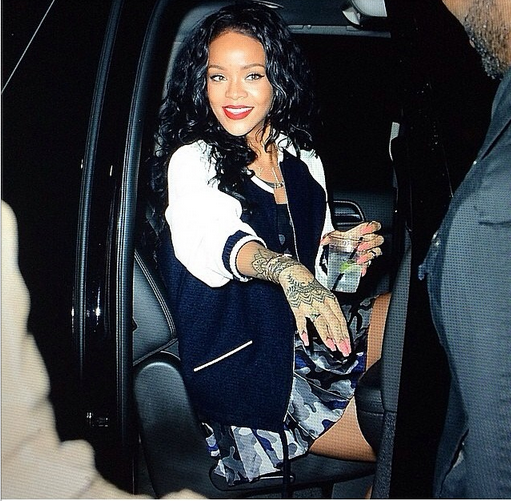Rihanna in Christopher Kane pleated camo skirt