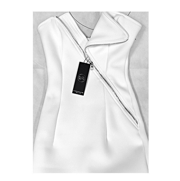 5 Draya Michele's Valencia Atelier White Strapless Zip Dress and Christian Louboutin Silver Pumps