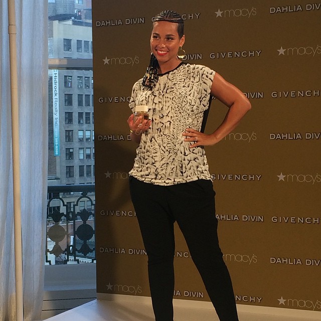 2  Alicia Keys's Givenchy Dahlia Divin Fragrance Launch Helmut Lang Shatter Print Black and White Top, Black Pants, and Polka Dotted Pumps