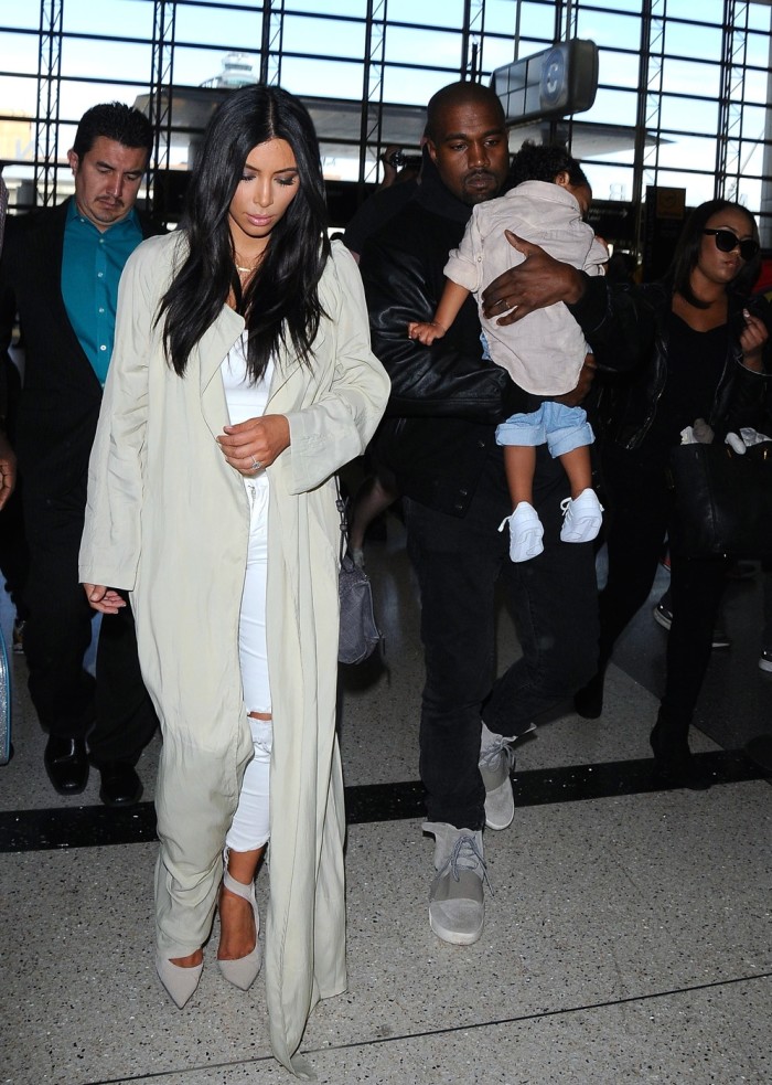 Kim Karadashian, Kanye and North make their way through LAX