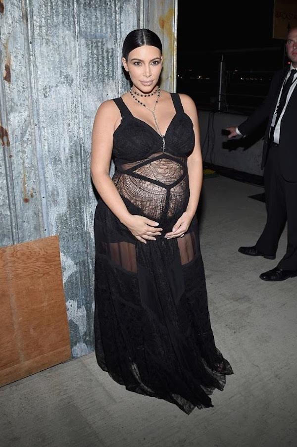 Kim Kardashian Transforms Her Cherry Snakeskin Trench Into a Day