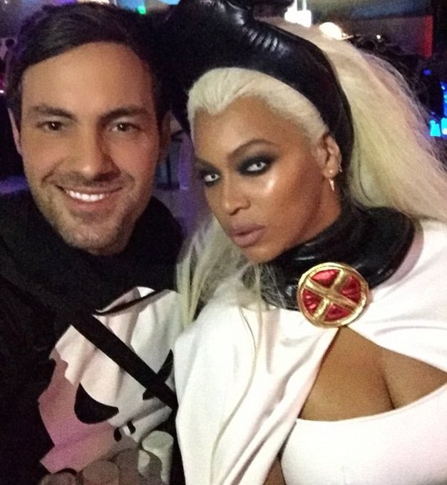 Beyonce posed as Storm, and made her look pop with a blond wig and ice blue contacts.