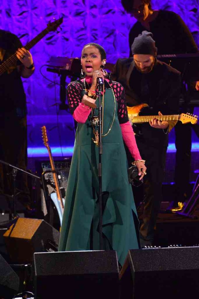 Lauryn Hill's Black Girls Rock! Performance Marni Spring 2016 Forest Green Jumpsuit, Black Perforated Shirt, and Pink and Brown Bangles