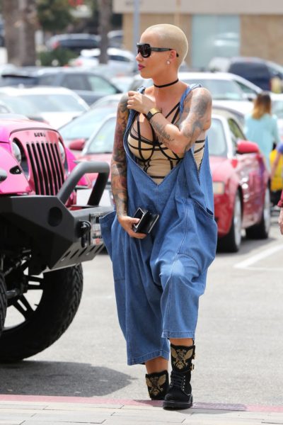 amber-rose-at-cheesecake-factory-69-crossover-oversized-linen-overalls-balmain-eagle-ranger-embroidered-suede-boots-1