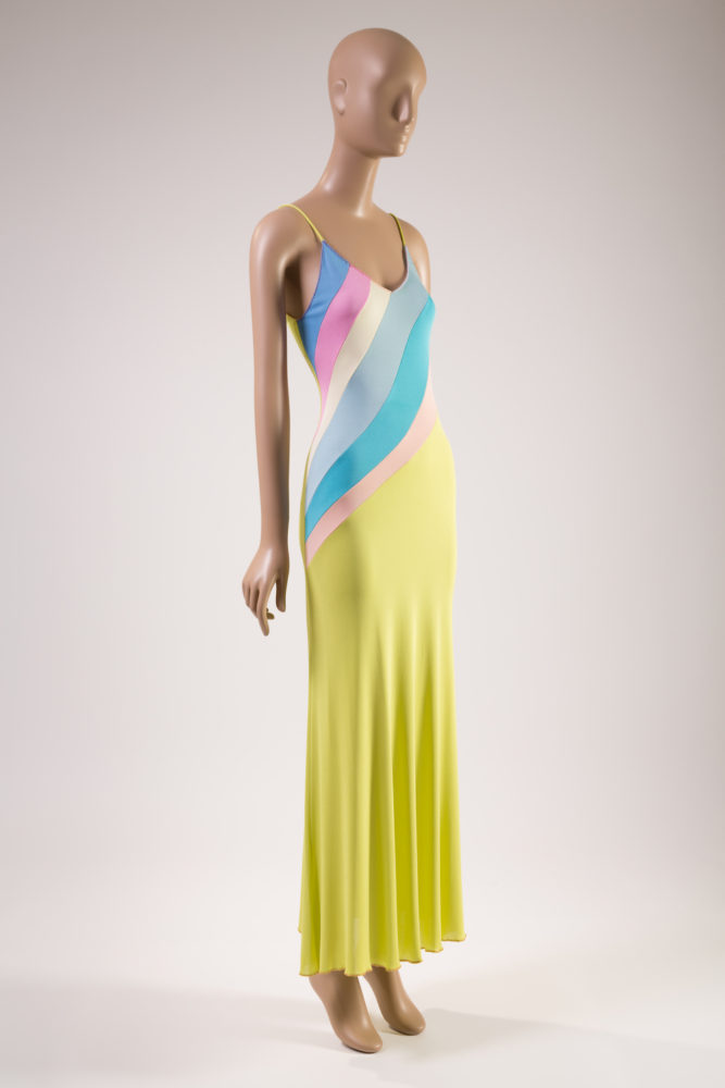 Color blocked slip style evening dress in rayon matte jersey in acid yellow, blue, pink, lavender & off white;  red lettuce edge