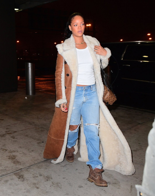 Splurge: Rihanna's JFK Airport Chloe Reversible Shearling Coat, Louis  Vuitton Palm Springs Backpack, and Timberland Heritage Boots – Fashion Bomb  Daily