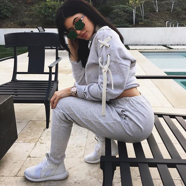 Accessories Haul Kylie Jenner s Instagram Dior Square Abstract Sunglasses in Havana Green Adidas Tubular Defiant Shoes in Color Core White and Les Petits Joueurs Mini Alex Eyes Fur Purse Fashion Bomb