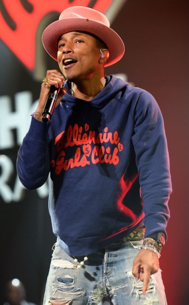 Pharrell Williams took the stage at Jingle Ball in Miami in a Billionaire Girls Club hoodie and a blush pink hat