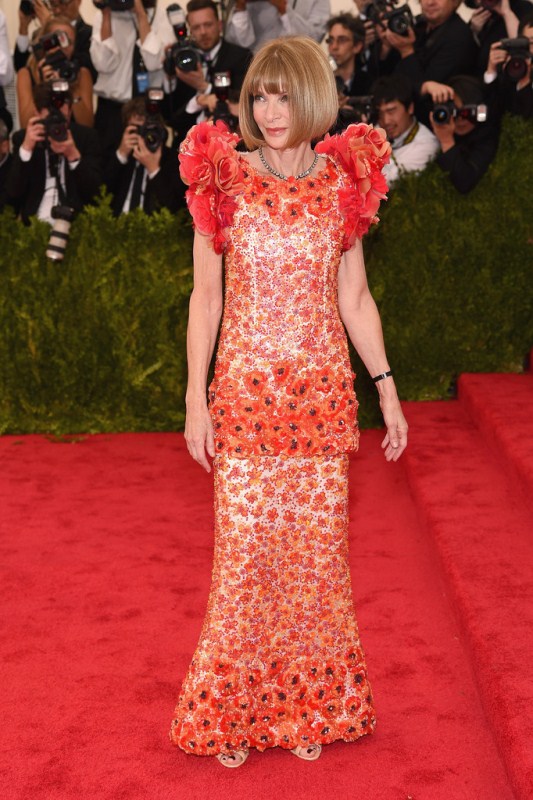 Anna Wintour is loyal to Chanel and she slipped on a rosette-embroidered confection from the iconic French fashion house’s Couture offerings.