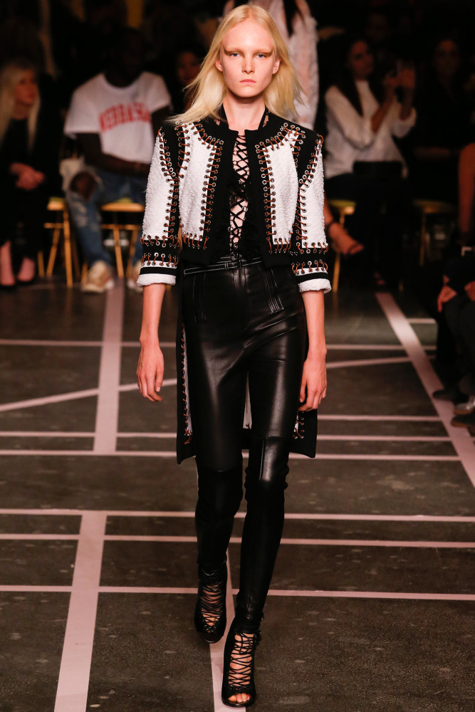 Kim Kardashian West vs. Marjorie Harvey in Givenchy's Spring 2015 Black Lace Up Jumpsuit