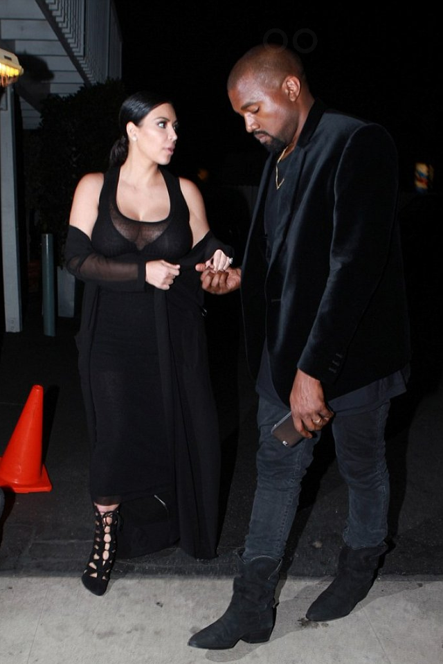 Kanye West and Kim Kardashian West kept it cute and coordinated in black 'fits at Giorgio Baldi restaurant.