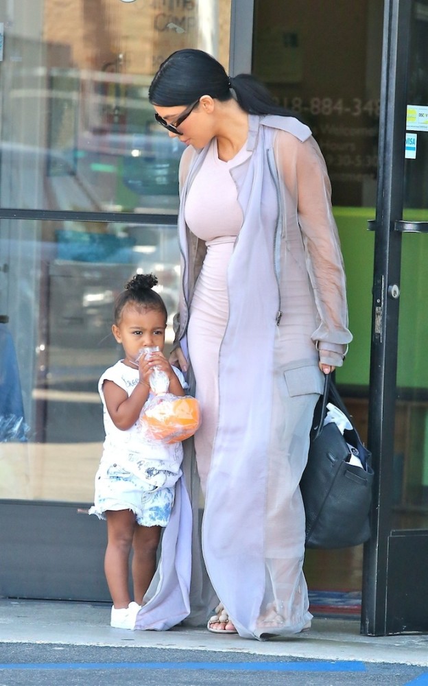 Pregnant Kim Kardashian heads to a birthday party with daughter North and niece Penelope Disick