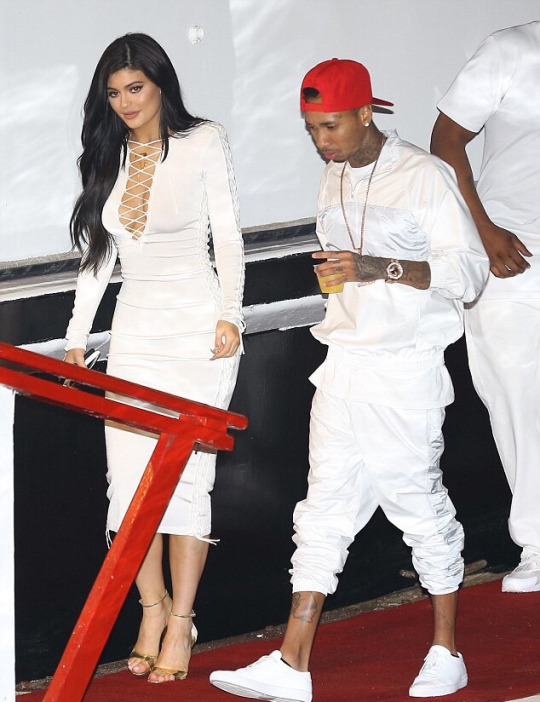 8 9 White Birthday Party with Khloe Kardashian in Ellery's Double Slit Skirt, Kylie Jenner in Balmain's Lace Up Dress, and Kim Kardashian in Ronny Kobo's Thiadora Ponte Racerback Midi Dress
