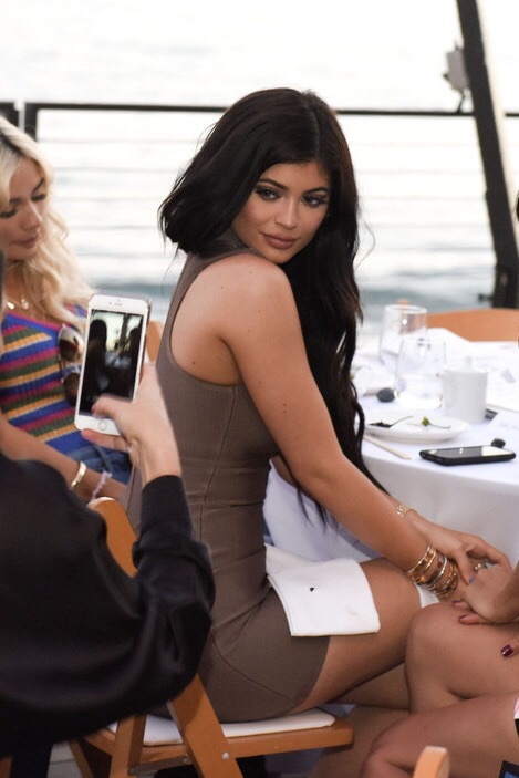 8 Kylie Jenner's Kris Jenner Haute Living Cover Celebration Mistress Rocks Exposure Taupe Cut Out Bandage Dress and Stuart Weitzman Pan Goose Napa Nudist Sandals