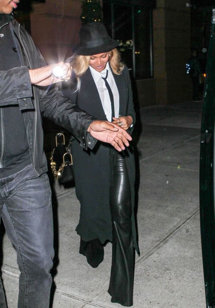 3 Beyonce's New York City Dinner Alice + Olivia Janis White Button Down with Neck Tie, Black Leather Bell Pants, and Talia Pleated Back Long Coat