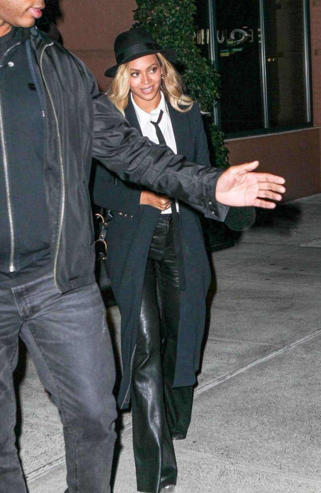 5 Beyonce's New York City Dinner Alice + Olivia Janis White Button Down with Neck Tie, Black Leather Bell Pants, and Talia Pleated Back Long Coat