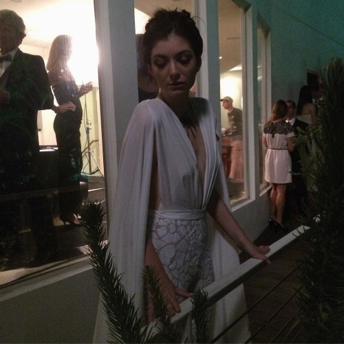 8  Lorde's Magnets Video Michael Costello White Cape Jumpsuit