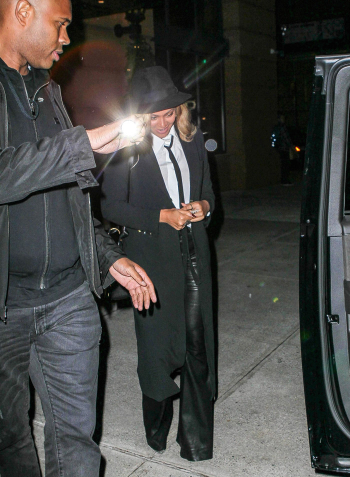 Beyonce's New York City Dinner Alice + Olivia Janis White Button Down with Neck Tie, Black Leather Bell Pants, and Talia Pleated Back Long Coat