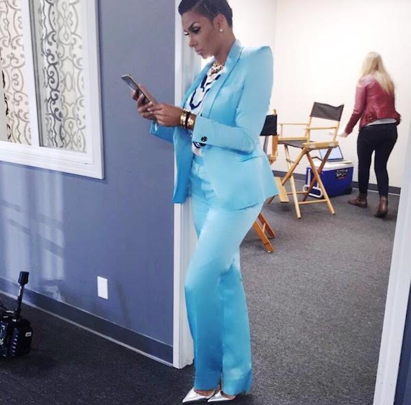 It's was all business and style for Lauran Govan who werked a blue suit with silver pumps.