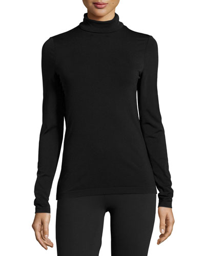 Get the Look: Draya Michele’s LA Wolford Black Turtleneck, ASOS Red ...