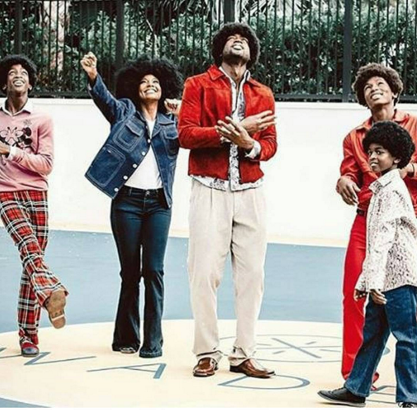 Forget the Jackson 5's! The Wade 5's gave thema run for their money in Afros and festive red and denim ensembles.