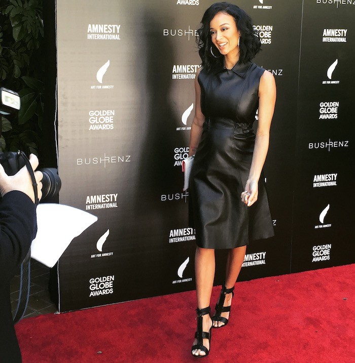 Draya Michele's Amnesty International USA's Inaugural Art for Amnesty Pre-Golden Globes Brunch Acne Studios Levice Black Leather Dress and Tom Ford Sandals