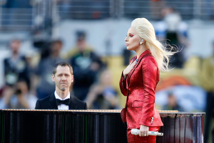 3 Lady Gaga Sings the National Anthem at Super Bowl 50 in a Gucci Red Sparkly Pants Suit