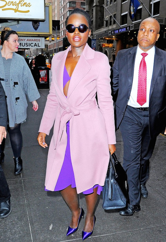 3 Lupita Nyong'o Wear a Pink Escada Coat and a Grape Purple Michael Kors Cut Out Wool Crepe Dress to the Today Show