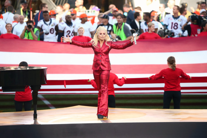Lady Gaga Sings the National Anthem at Super Bowl 50 in a Gucci Red Sparkly Pants Suit