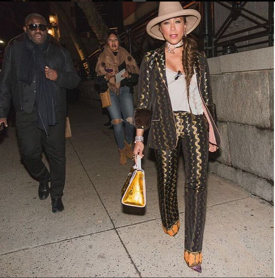 Marjorie Harvey's Marc Jacobs Show Gucci Wool and Mink Printed Suit + Her DKNY Fashion Show Blue Feathered Jumpsuit
