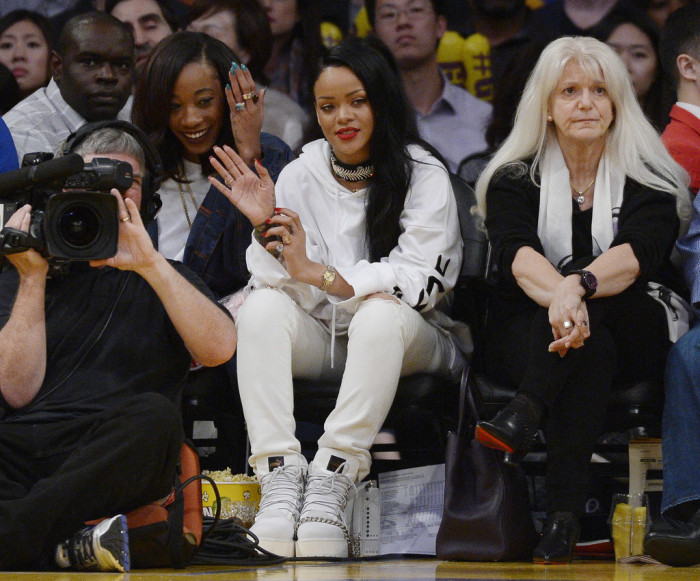 Rihanna+Celebrities+Attend+Lakers+Game-christian-dior-fenty-puma-citizens-of-humanity-1