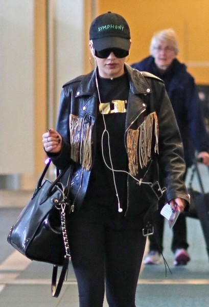 Rita Ora's Vancouver International Airport Saint Laurent Fringed Biker Jacket 7