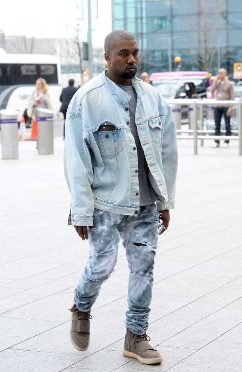 Kanye West rocked a denim look as seen in London Heathrow Airport.