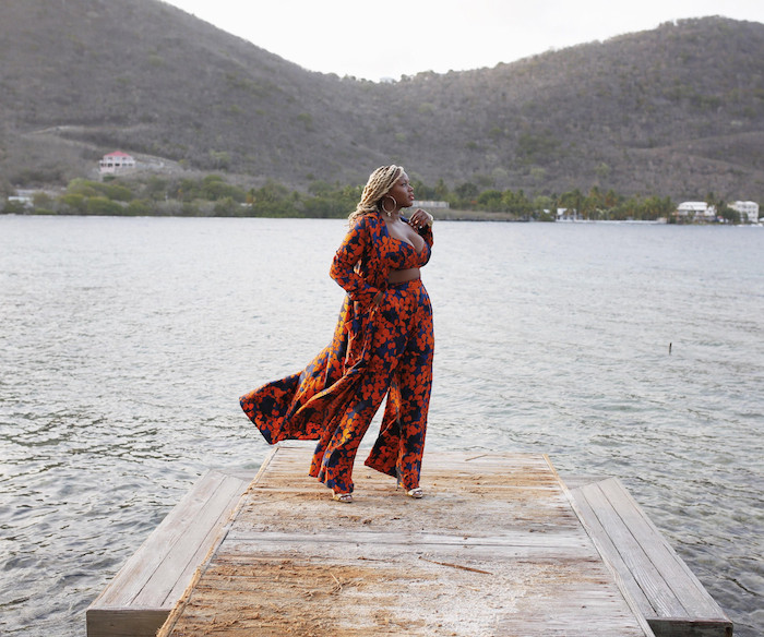 Claire-Sulmers-donned-a-blue-and-orange-pant-jumpsuit-while-out-on-vacation