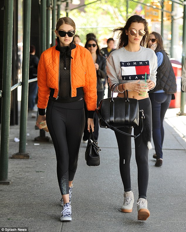Gigi-Hadid-Bella-Hadid-V-Files-Orange-bomber-jacket-Versace-palazzo-black-bag-vans-1