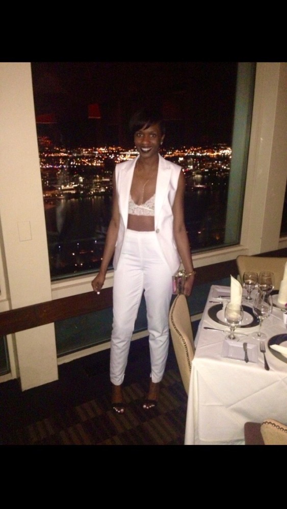 Mimi of @misquared89 wore a white open suit with a white crop top perfect for a night out on the town. YUM!