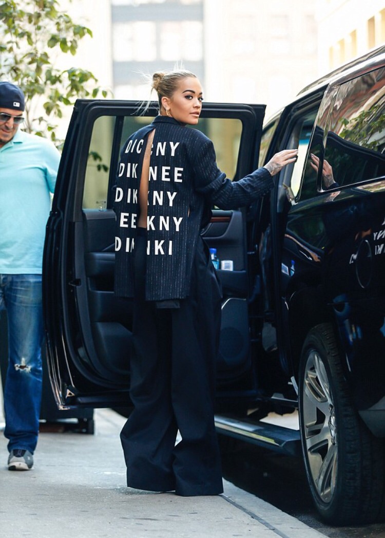 3-Rita Ora-New York City DKNY Fall 2016 Pinstripe Draped Front Suit Jacket