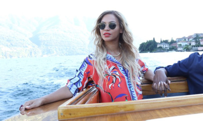 Beyonce Wears Emilio Pucci Fall 2016 Red, Purple, and Blue Printed Shirt and Pants While In Paris