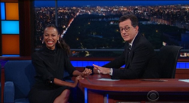 Zoe Saldana The Late Show Victoria Beckham Black Crepe de Chine Knot Blouse, Matching High Waisted Pencil Skirt, and Christian Louboutin 'Uptown' Red Ankle Strap Pumps 6