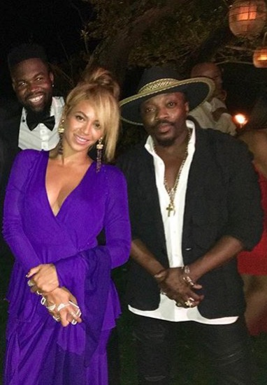 Beyonce Attends Lyor Cohen's Hamptons Wedding in Roberto Cavalli Violet Long-Sleeved Tiered Ruffle Jersey Gown 1