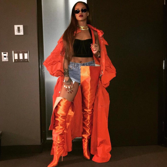Rihanna's OVO Fest Feng Chen Wang Orange Parachute Coat and Vetements x Manolo Blahnik Thigh High Boots