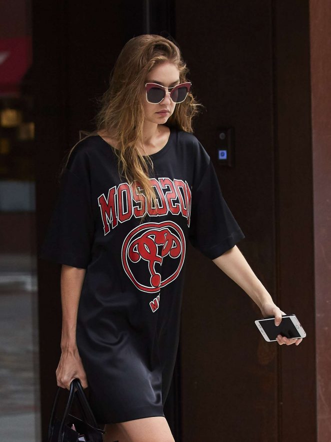 gigi hadid dons an all black outfit with a versace bag as she heads out in  new york city-090318_11