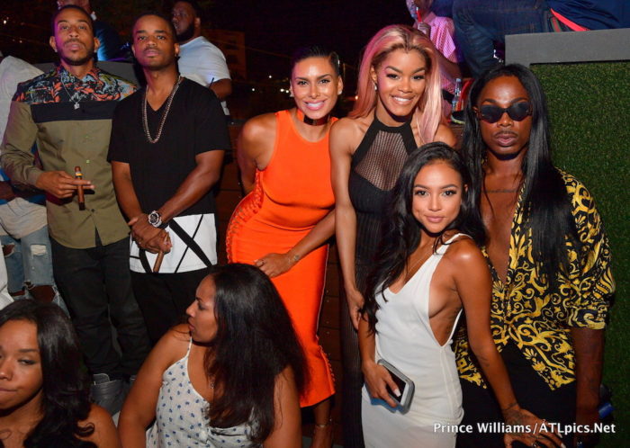 Ludacris in Versace's Contrast Floral Print Olive Green Shirt, Laura Govan in House of CB's Martinique Orange Side Weave Bandage Dress, Karrueche Tran's Nasty Gal White Sheer Mini Dress, and More!