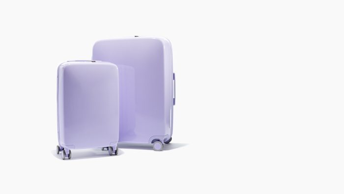radens-gps-equipped-a50-suitcase-a50-set-hero-light-purple-gloss-desktop